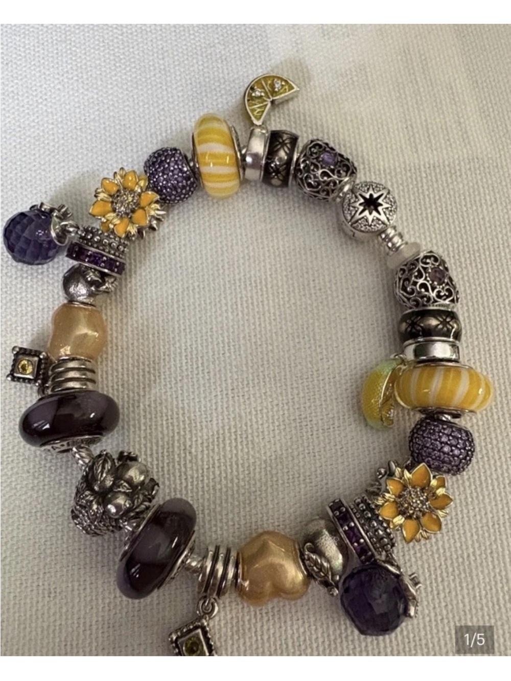 Pandora bracelet with purple and yellow lemon theme